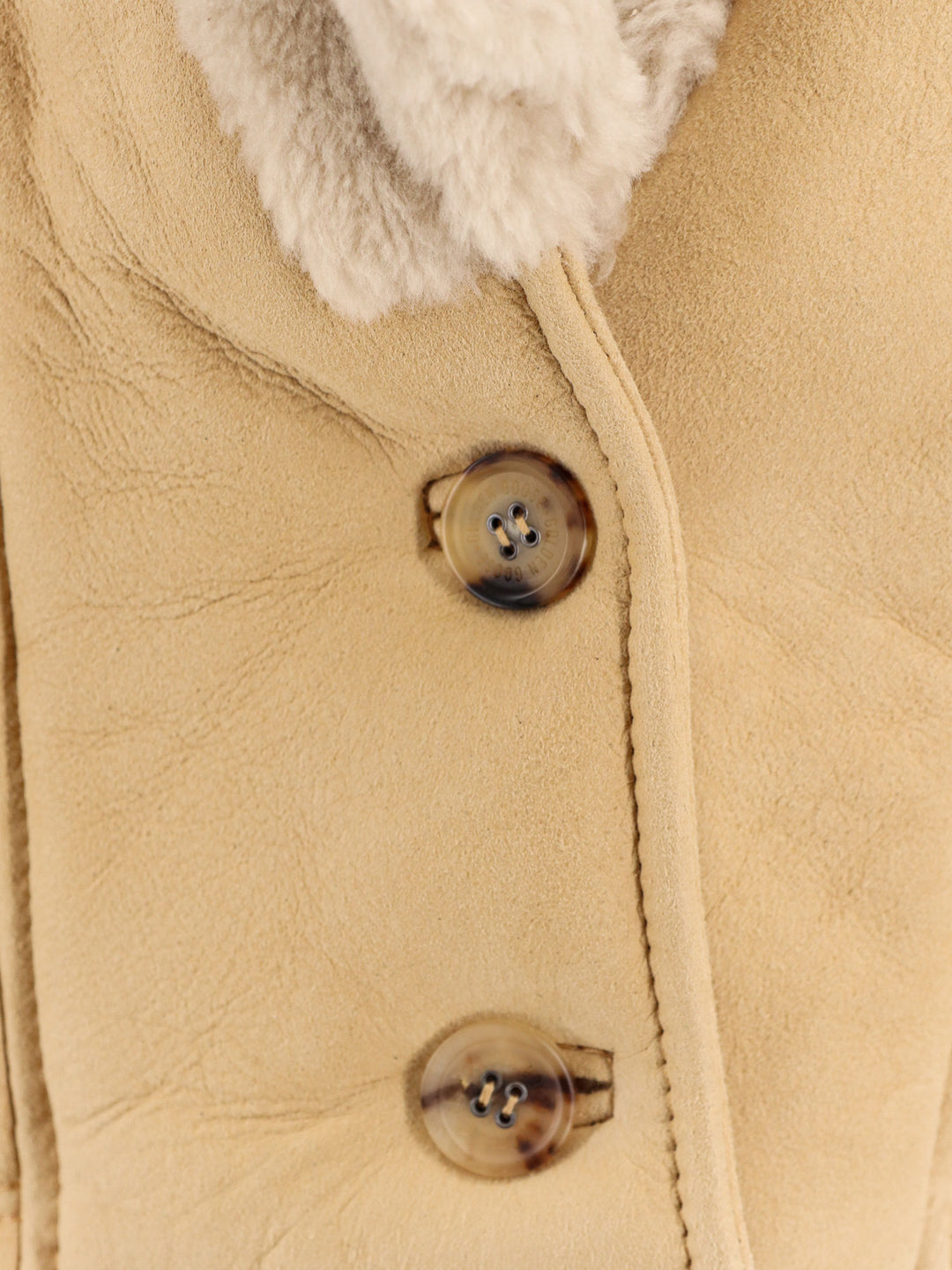 Montone in suede con fodera in shearling