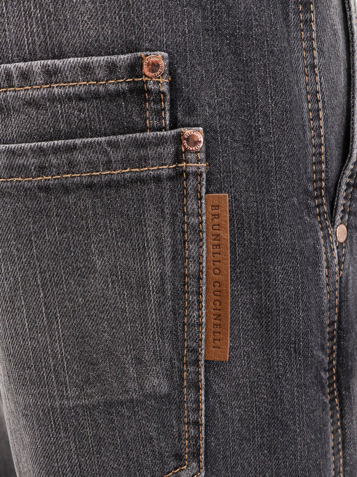 Pantalone black denim con etichetta logo in pelle