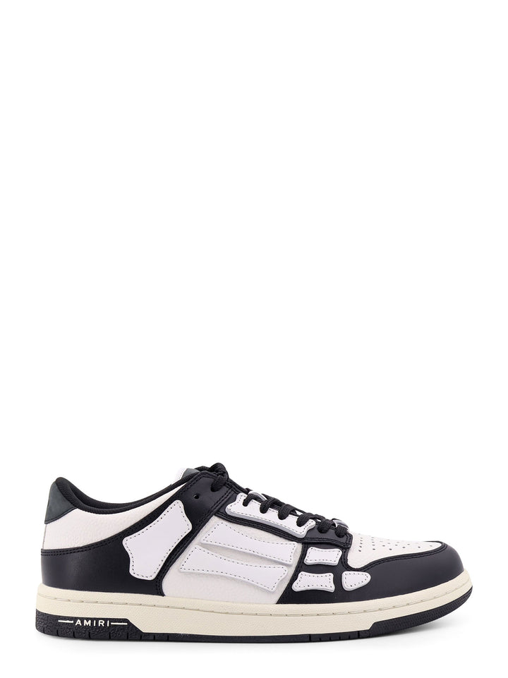 Sneakers in pelle con inserti a contrasto