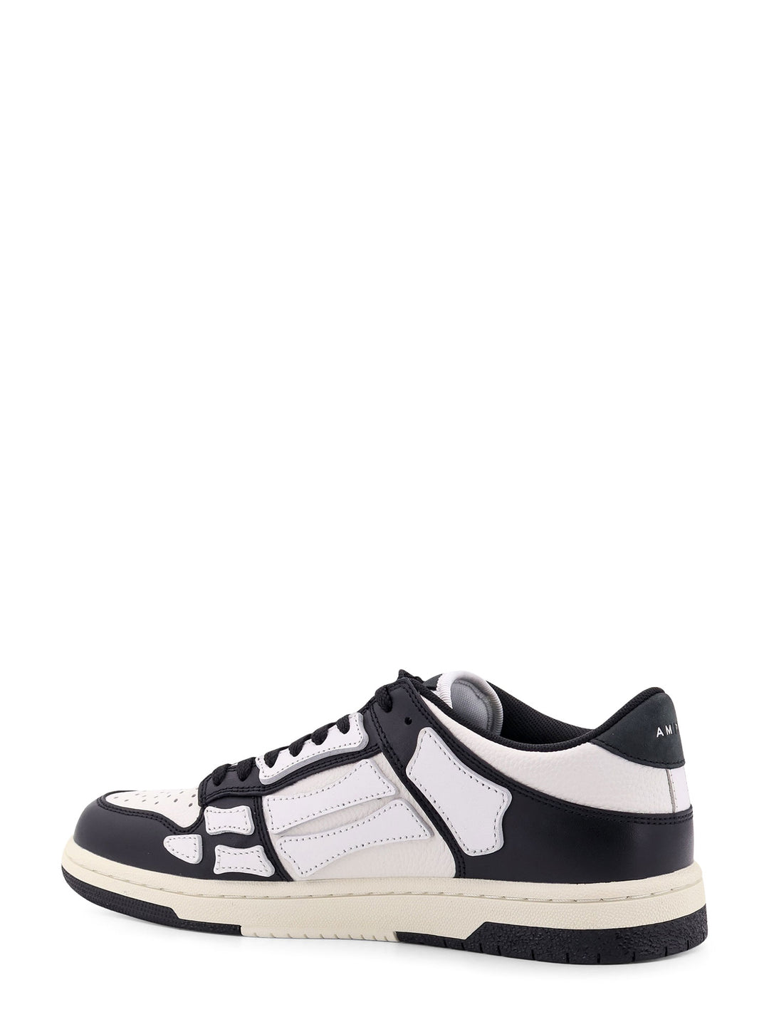 Sneakers in pelle con inserti a contrasto